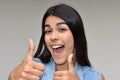 Youthful Girl With Thumbs Up Royalty Free Stock Photo