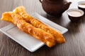 Youtiao. Long golden brown deep fried dough strip