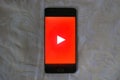 Youtube app on an android phone with white texture background Royalty Free Stock Photo