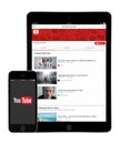 YouTube application on the Apple iPad Air 2 and iPhone 5s display Royalty Free Stock Photo