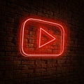 Youtube icon with a form neon lamp hanging in the wall