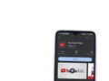 YouTube Kids app play store page on smartphone on white background