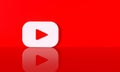 Youtube logo on red wall background with hard shadow and space for text and graphics