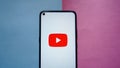 YouTube logo on smartphone screen Royalty Free Stock Photo