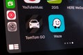 Youtube music, TomTom go logo of Apple carplay on the screen of cars dashboard, September 2020, San Francisco, USA.