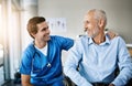 Youve got my absolute support. a male nurse caring for a senior patient. Royalty Free Stock Photo