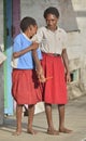 YOUW VILLAGE, ATSY DISTRICT, ASMAT REGION, IRIAN JAYA, NEW GUINEA, INDONESIA - MAY 23, 2016: Schoolchildren in uniform. Small