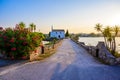 Ypapanti Church - Beautiful scenery at sunset in Gouvia Bay Ã¢â¬â small ancient white church on a pier, Corfu island, Ionian sea, Royalty Free Stock Photo