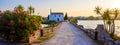 Ypapanti Church - Beautiful scenery at sunset in Gouvia Bay Ã¢â¬â small ancient white church on a pier, Corfu island, Ionian sea, Royalty Free Stock Photo