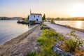 Ypapanti Church - Beautiful scenery at sunset in Gouvia Bay Ã¢â¬â small ancient white church on a pier, Corfu island, Ionian sea, Royalty Free Stock Photo