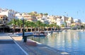 Ãâ¢ypical European tourist city by the sea in turquoise lagoon, reflection of houses in the blue water, seagulls flying in the