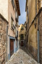 Ypical narrow alley in the old town of Toledo Royalty Free Stock Photo