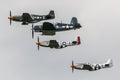 P-51 Mustangs and an F4U Corsair at Thunder Over Michigan