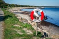 Ystad, Sweden - May 14, 2019: On the sea shore of Ystad, Southern Sweden, Scandinavia, Europe. Life belt in front of the Baltic Royalty Free Stock Photo