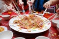 Yu Sheng Spring Toss also known by 2015 Yee Sang Prosperity Toss is a Chinese New Year Dish