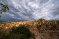 Yuanmou soil forest with full of cumulonimbus clouds Royalty Free Stock Photo