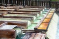 Yubatake hot spring wooden boxes with mineral water Royalty Free Stock Photo