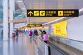 Visitors walk around departure hall inside Chongqing Jiangbei international airport terminal