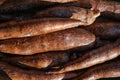 Yuca / Macaxeira Manihot esculenta roots displayed at food market in London, sun shines on
