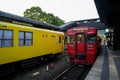 Yufuin, Japan - May 13, 2017 :Red and yellow color vintage train diesel cars of JR Kyushu Railway Company stopped on rail