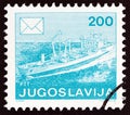 YUGOSLAVIA - CIRCA 1986: A stamp printed in Yugoslavia from the `Postal Services` issue shows Freighter, circa 1986.