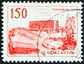 YUGOSLAVIA - CIRCA 1961: A stamp printed in Yugoslavia shows Titograd Hotel, circa 1961.