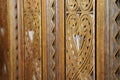 Yugoslavian brown carved heart, star, and zigzag wood wall paneling