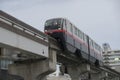 Yui Rail or Okinawa Urban Monorail running on track at twilight in Okinawa, Japan Royalty Free Stock Photo