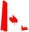 Yukon map with Canadian flag - the smallest and westernmost of Canada`s three federal territories