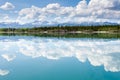 Yukon wilderness cloudscape reflected on calm lake Royalty Free Stock Photo
