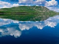 Yukon wilderness reflected on calm lake Royalty Free Stock Photo