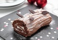 Yule log cake on a Christmas table