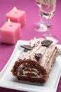 Yule log cake on a Christmas table Royalty Free Stock Photo