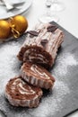 Yule log cake on a Christmas table