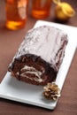 Yule log cake on a Christmas table Royalty Free Stock Photo