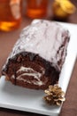 Yule log cake on a Christmas table Royalty Free Stock Photo