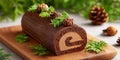 Yule Logor or Chocolate sponge cake rolled and decorated like a log on the table Royalty Free Stock Photo