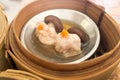 Yumcha, various chinese steamed dumpling in bamboo steamer in chinese restaurant. Dimsum in the steam basket, Hong kong local food