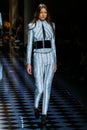 Yumi Lambert walks the runway during the Balmain show