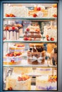 yummy assortment baked pastry in bakery. Various Different Types Of Sweet Cakes In Pastry Shop Glass Display. Good