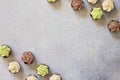 Yummy Assortment chocolate candies. Chocolate with vanilla, chocolate and pistachio cream on marble background.