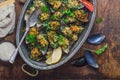 Yummy baked mussels under cheese and lemon, copy space Royalty Free Stock Photo