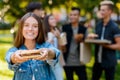 Yummy burger in girl`s hands Royalty Free Stock Photo