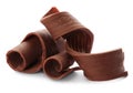 Yummy chocolate curls for decor on white background