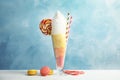 Yummy cotton candy in glass served with sweets Royalty Free Stock Photo