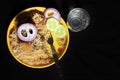 Yummy delicious Indian Chicken Biriyani on yellow plate isolated on black background. Royalty Free Stock Photo