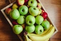 Yummy fruits: apples and bananas Royalty Free Stock Photo