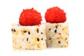 Yummy Japanese fusion rolls with sesame seeds topped with red ro