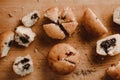 Yummy muffins with chocolate and berry filling on a cutting board Royalty Free Stock Photo