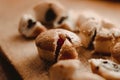 Yummy muffins with chocolate and berry filling on a cutting board Royalty Free Stock Photo